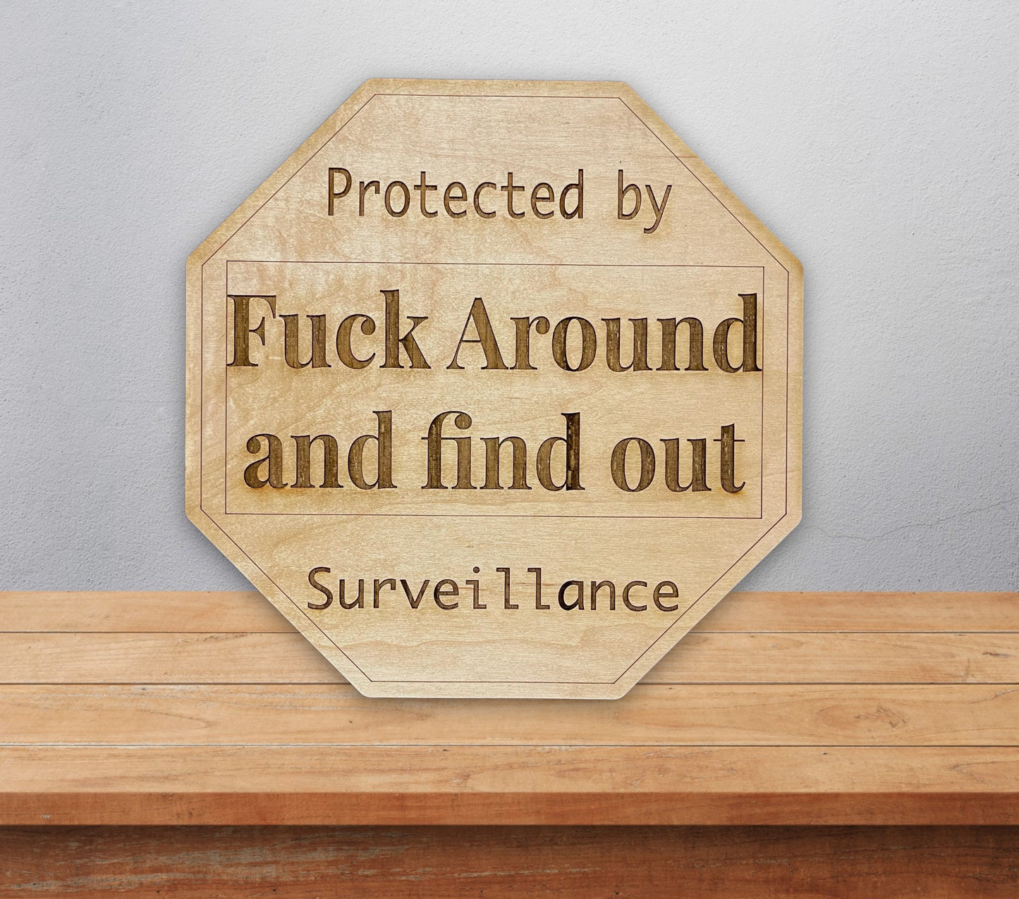 Protected by Fuck around and find out surveillance sign