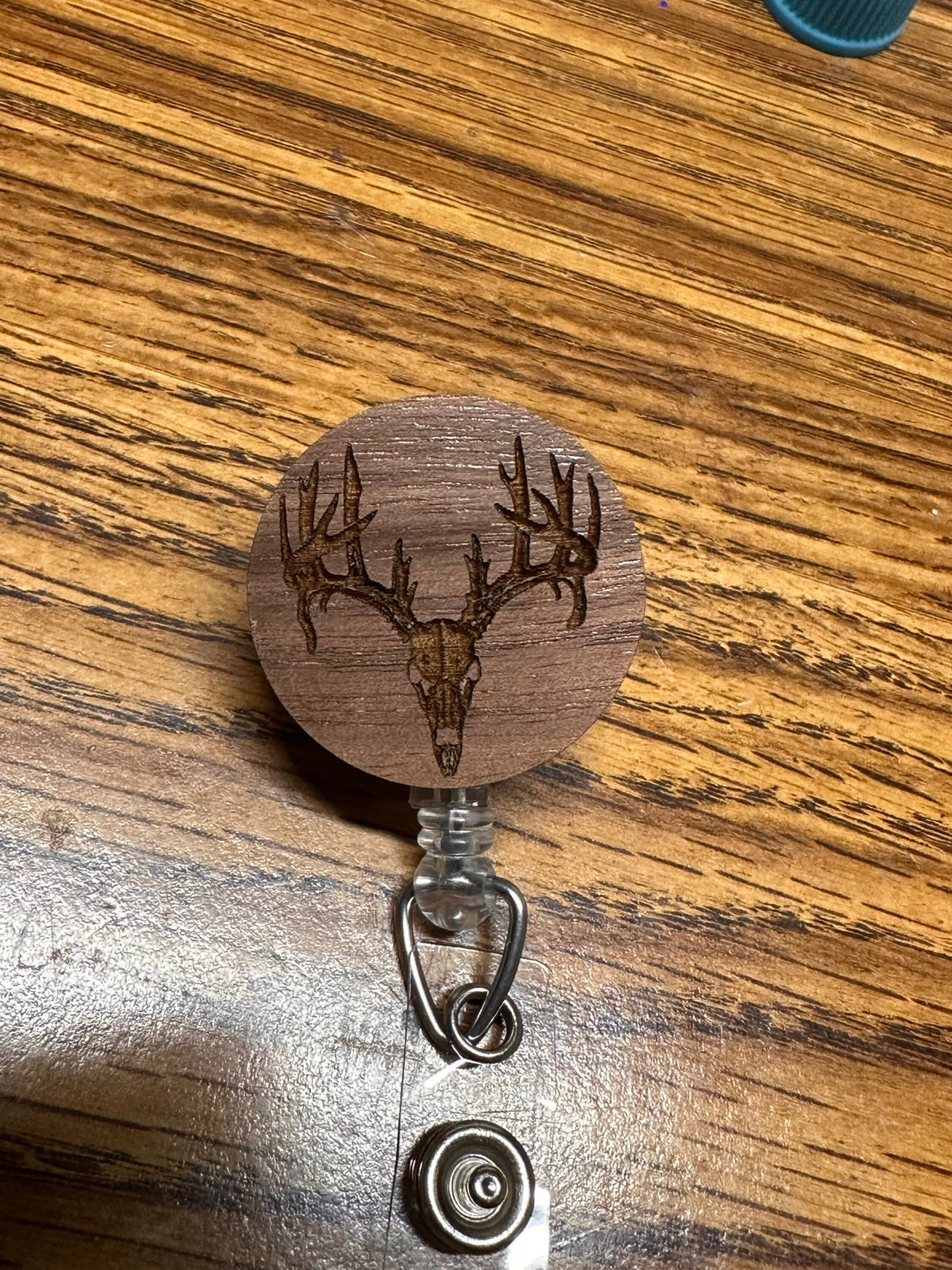 Deer skull retractable badge reel