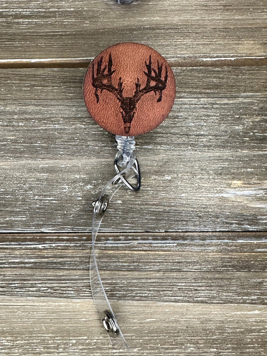 Leather Engraved Deer skull badge reel on veg tanned leather